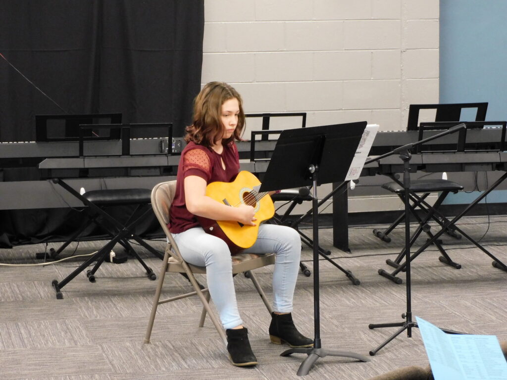 Guitar student showcases learning at Fall 2022 recital