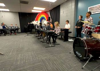 Ensemble of A Child's Song students perform at seasonal recital